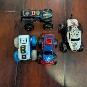 Action-Packed Monster Truck Set - Black, Blue, Red, White